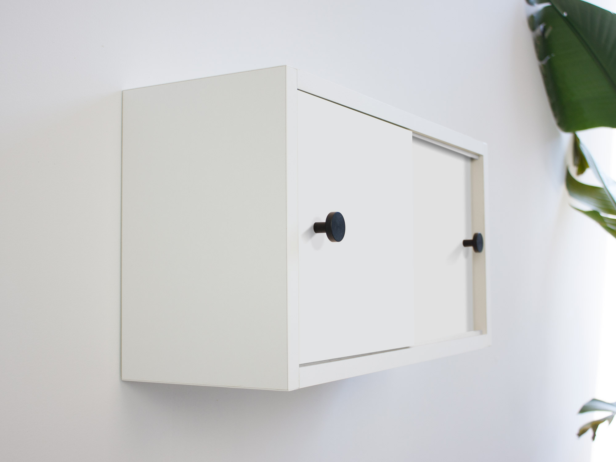 Custom White Wall Mount Cabinet with Sliding Doors